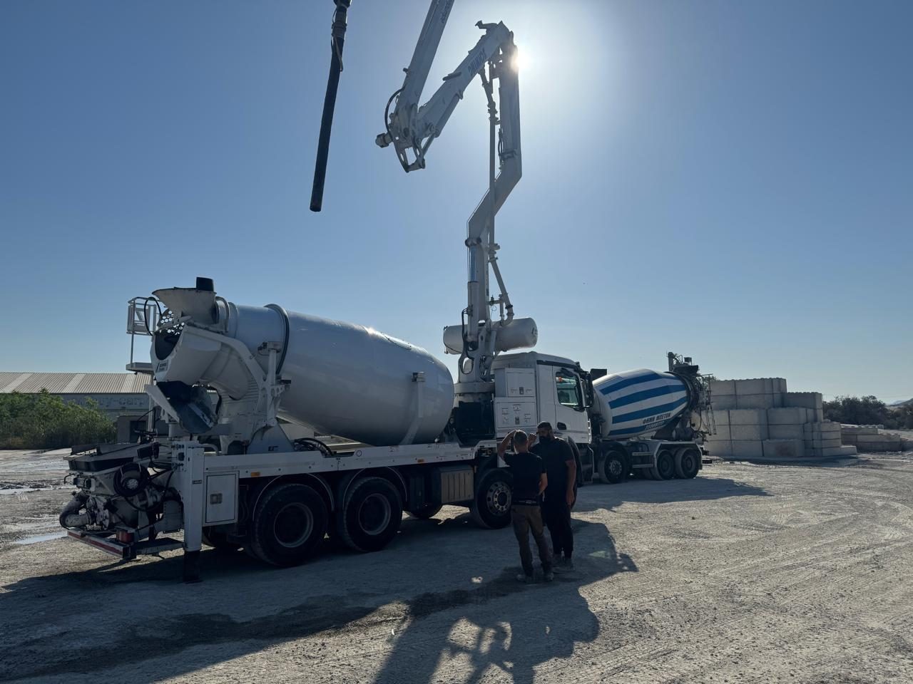 Truck mixers and pump at a ready-mix plant